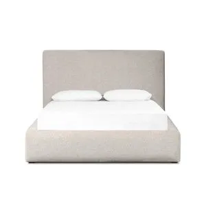 Upholstered Quincy Bed with padded headboard and frame in light textured boucle fabric, clean modern silhouette