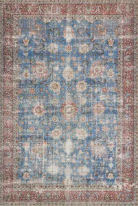 Loren Blue / Brick Rug with vintage floral and geometric patterns in blue, red, and cream tones on a soft polyester base