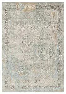 Traditional green and light gray rug with an intricate medallion pattern in cream, gold, blue, and charcoal accents