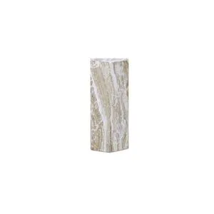 Tall five-sided outdoor side table with beige and white marble-like textured concrete finish