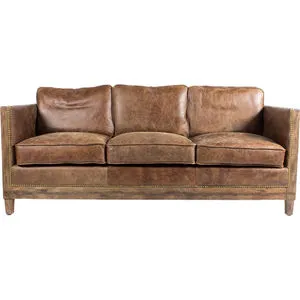 Darlington Sofa with three seat cushions, soft grain leather upholstery, and exposed rustic wooden frame.