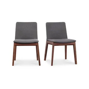 Set of two Deco Dining Chairs with solid walnut frames and gray upholstered polyester seats and backs.