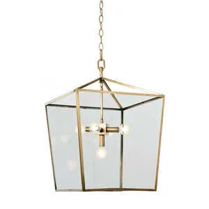 Steel pendant lantern with natural brass finish and clear glass panels in a geometric design with four bulb fixtures inside