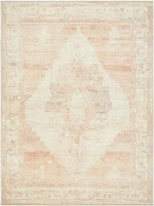 Luca Dusty Pink machine woven rug with faded vintage medallion and muted dusty pink and cream tones