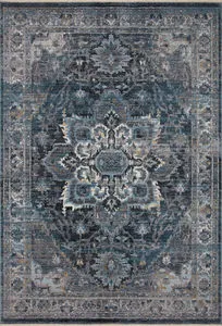 Full top-down view of Samra denim rug revealing central medallion and detailed border in muted blue and grey