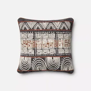Square decorative pillow with geometric tribal-inspired patterns in black, white, and brown with rust-colored piping