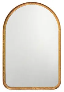 Arched wall mirror with intricate gold leaf metal frame and smooth reflecting surface