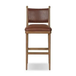 Counter stool with mahogany leather seat and back featuring exaggerated stitching and antique walnut frame
