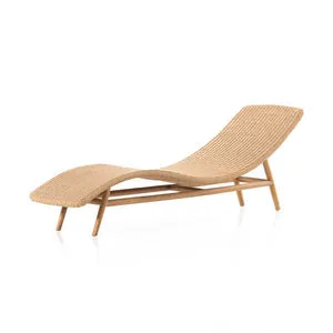 Portia Outdoor Statement Chaise in all-weather light wicker with curved vintage shape on solid teak frame