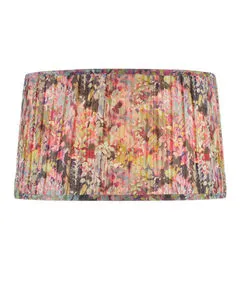 Pleated tapered lampshade with lush wildflower pattern in magenta, yellow, and green hues
