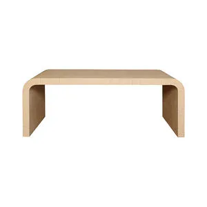 Natural grasscloth coffee table with seamless curved waterfall edges and woven texture