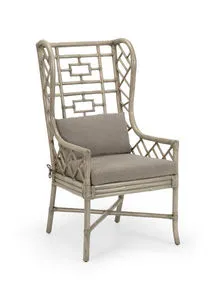 Asian inspired rattan wing chair with gray finish and nubby gray velour seat and back cushions