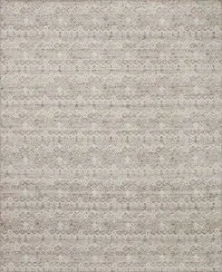 Ivory geometric rug with layered, dimensional pattern in soft neutral tones, thick and sturdy weave