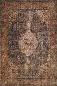 Loren Plum / Multi vintage style rug with distressed orange, navy, purple, and beige medallion pattern