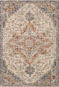 Traditional Sorrento Ivory Fiesta rug with vintage-inspired intricate patterned medallion in warm beige, blue, and rust tones
