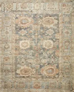 Traditional Margot Ocean Spice rug with ornate floral motifs in blue, beige, and brown tones, plush cloud-like texture