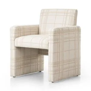 Kima Dining Chair angled view showing thick, cushioned armrests and seat depth