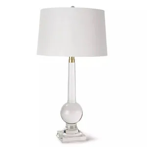 Stowe crystal table lamp with clear solid crystal base featuring a spherical element and tapered column topped with a whit...