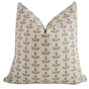 Square taupe pillow cover with white embroidered leaf pattern on natural linen-look cotton fabric
