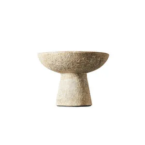 Eris Rustic Sand Bowl with textured terracotta, wide shallow bowl on a tapered pedestal base in sandy beige