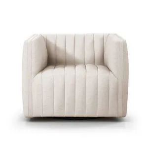 Front view of Augustine Swivel Chair showing deep vertical channeling on seat and back cushions