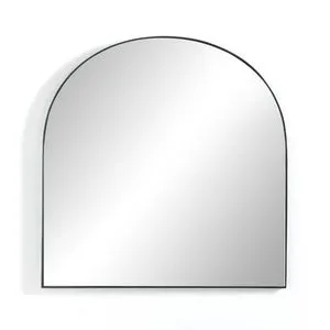 Arched Georgina Wide Mirror with a slim matte black frame, ideal for mantel or fireplace styling