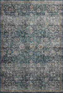 Anniston Lagoon Natural Rug with traditional motifs in distressed blue and beige tones