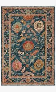 Rectangular Padma Marine Multi Rug with dense wool pile in bold floral asymmetrical design on deep blue background