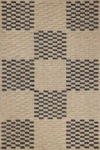 Hand-tufted beige and midnight wool rug with alternating high-low pile checkered linear pattern