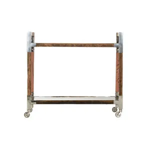Bar cart viewed from back showing wood grain and nickel bracket details on corners