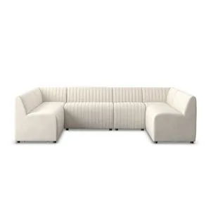 U-shaped dining banquette in oatmeal fabric with vertical channeling and cushioned seats