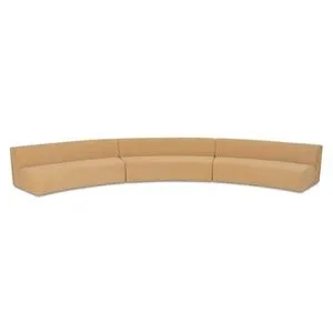 Three-piece concave modular sectional sofa in soft tan textured fabric with sculptural crescent shape