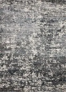 Augustus Denim Rug with abstract pattern in shades of blue, gray, and beige, flat woven texture