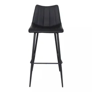 Black contemporary bar stool with vertical stitched faux leather seat and slim metal legs with footrest