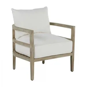 Santa Barbara Teak Lounge outdoor accent chair with grayish natural teak frame and white cushions