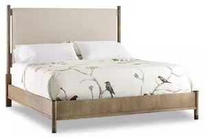 Affinity California King Upholstered Bed with tall, light beige linen headboard and greige oak frame with bird-themed bedding