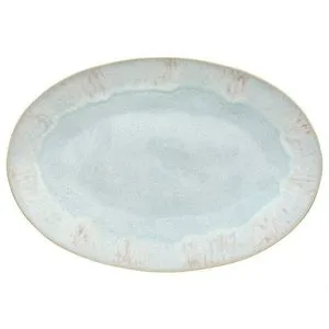 Large oval stoneware platter with soft sea blue glaze and subtle speckled texture with earthy rim accents