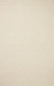 Ivory rug with tone-on-tone traditional motif pattern in a hand-tufted wool pile