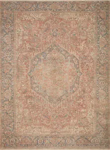 Full top-down view of Priya Brick Navy rug displaying overall medallion and border design in muted brick and navy tones