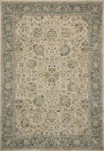 Traditional Briar Porcelain Coast Rug with vintage-style floral motifs and a blue-green border on a cream background