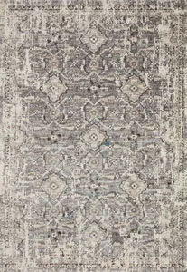 top-down view showing full layout of symmetric medallion and geometric patterns in natural and grey shades