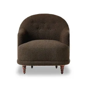 Front view of Marnie Chair showing round seat cushion and button tufted back