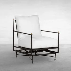 Roma Aluminum Outdoor Spring Lounge Chair with dark metal frame, white cushions, and brass finials on armrests