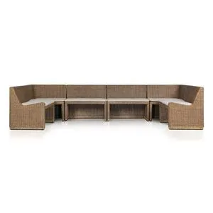 Senna Dining Banquette in antique-inspired coastal style with rattan frame and light fabric cushions, sectional bench design
