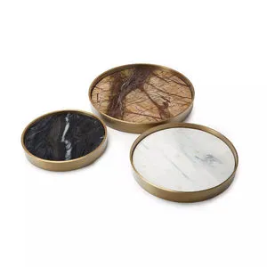 Set of three round brass mixer trays with brown, black, and white marble inlays in varying sizes