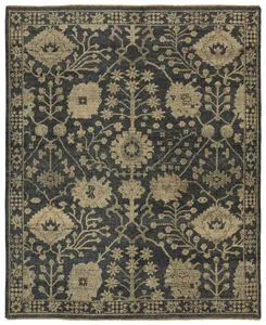Maeli Hand-Knotted Floral Rug with abrached dark gray, khaki, cream, and green floral pattern and decorative border