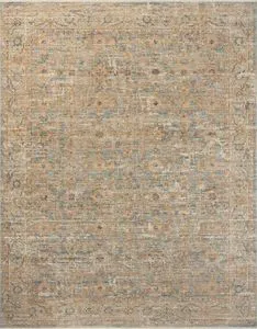 Heritage Ocean / Sand Rug with vintage-inspired motifs in sandy beige and blue tones, featuring a variable-pile texture.
