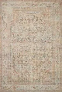 Adrian Natural Apricot Rug with vintage-inspired traditional floral and geometric motifs in warm apricot tones