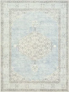 Lila Denim/Seafoam machine woven rug with a vintage style geometric medallion pattern in soft blue and beige tones
