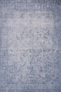 Loren Slate Rug with vintage hand-knotted floral pattern in soft blue and gray tones, textured polyester base